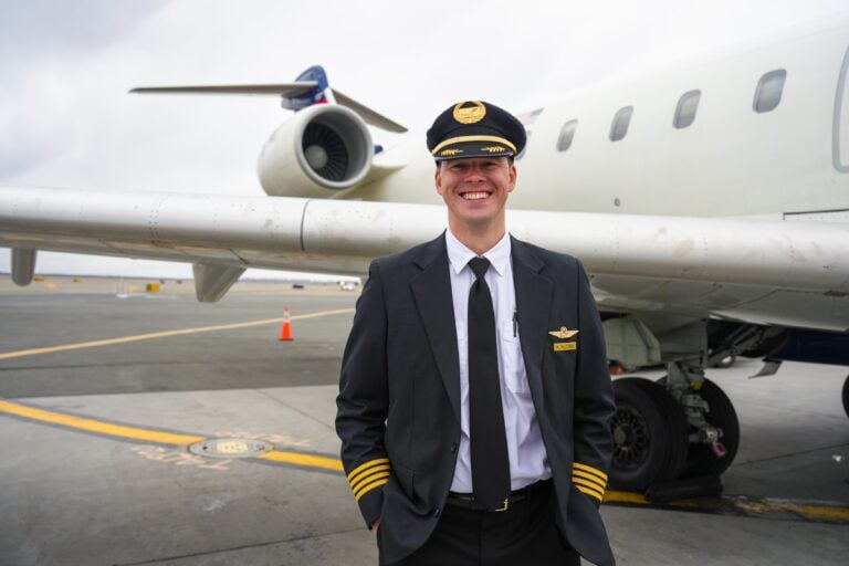 Pilot in front of plane