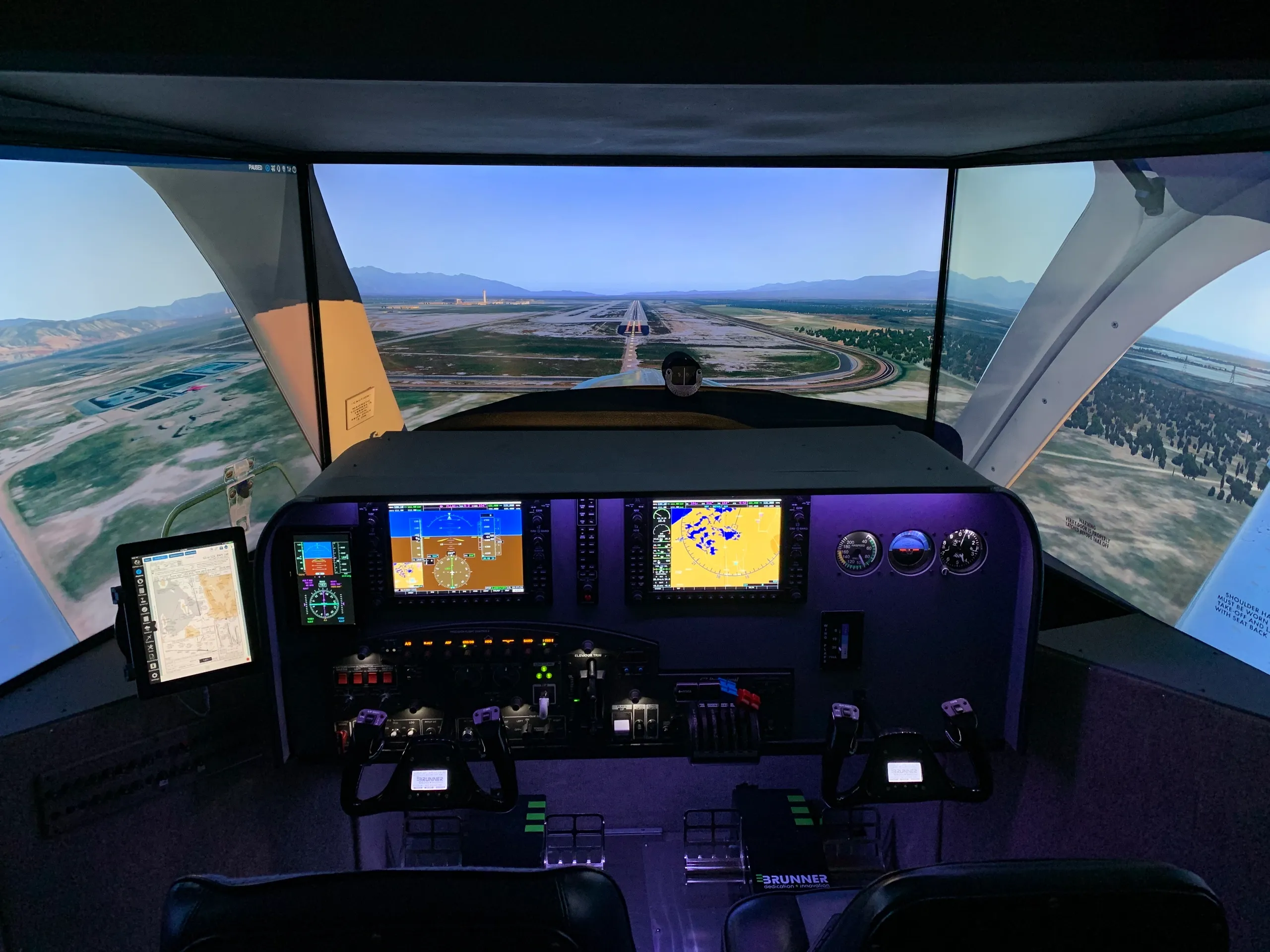 JAXAERO Virtual Aviation VA05 simulator with full glass flight deck and wraparound visuals
